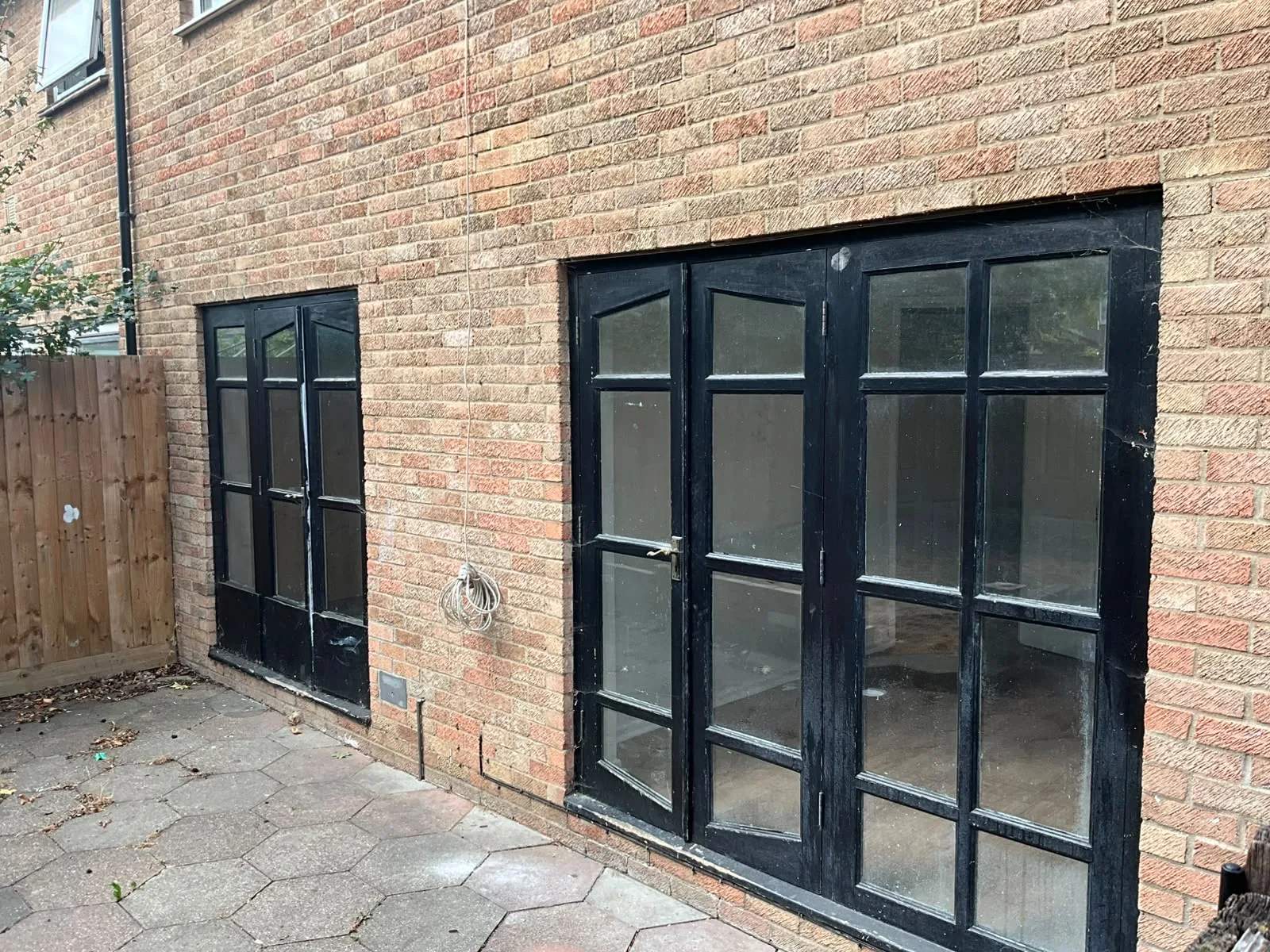 Crittall-style glazed doors on a new brick extension in Cambridge