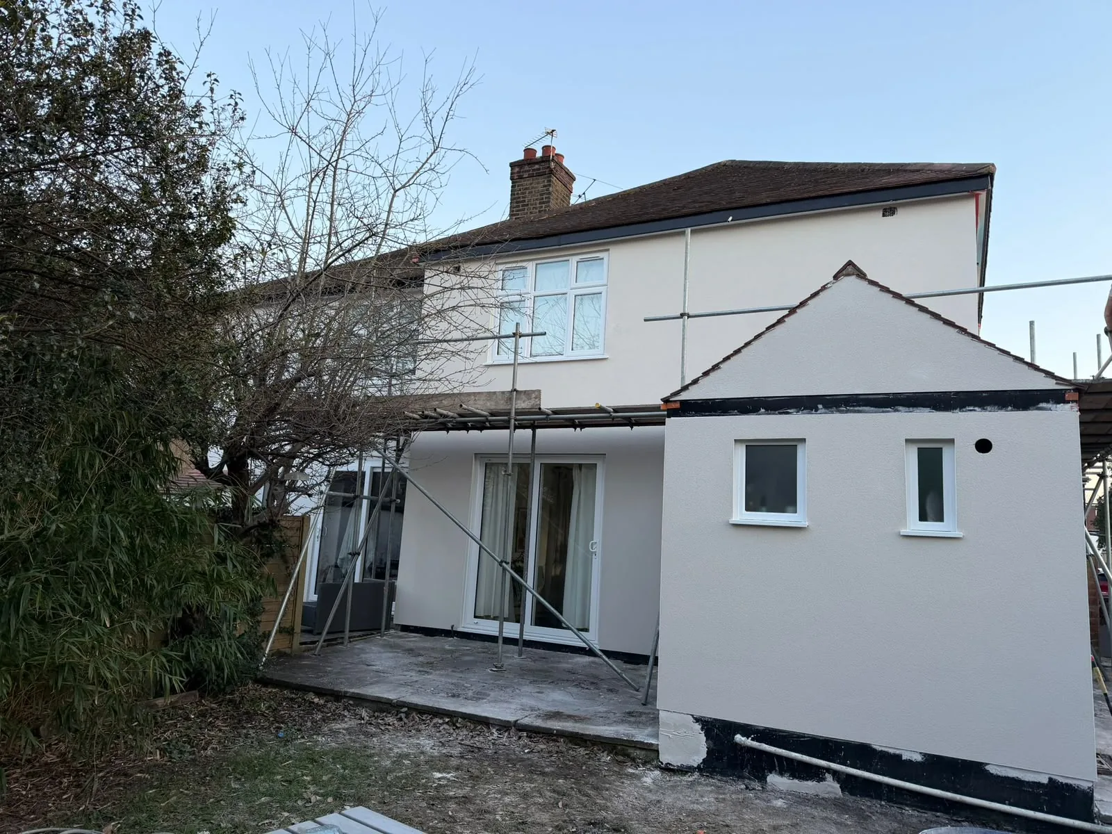 A finished rendered rear extension on a Cambridge home