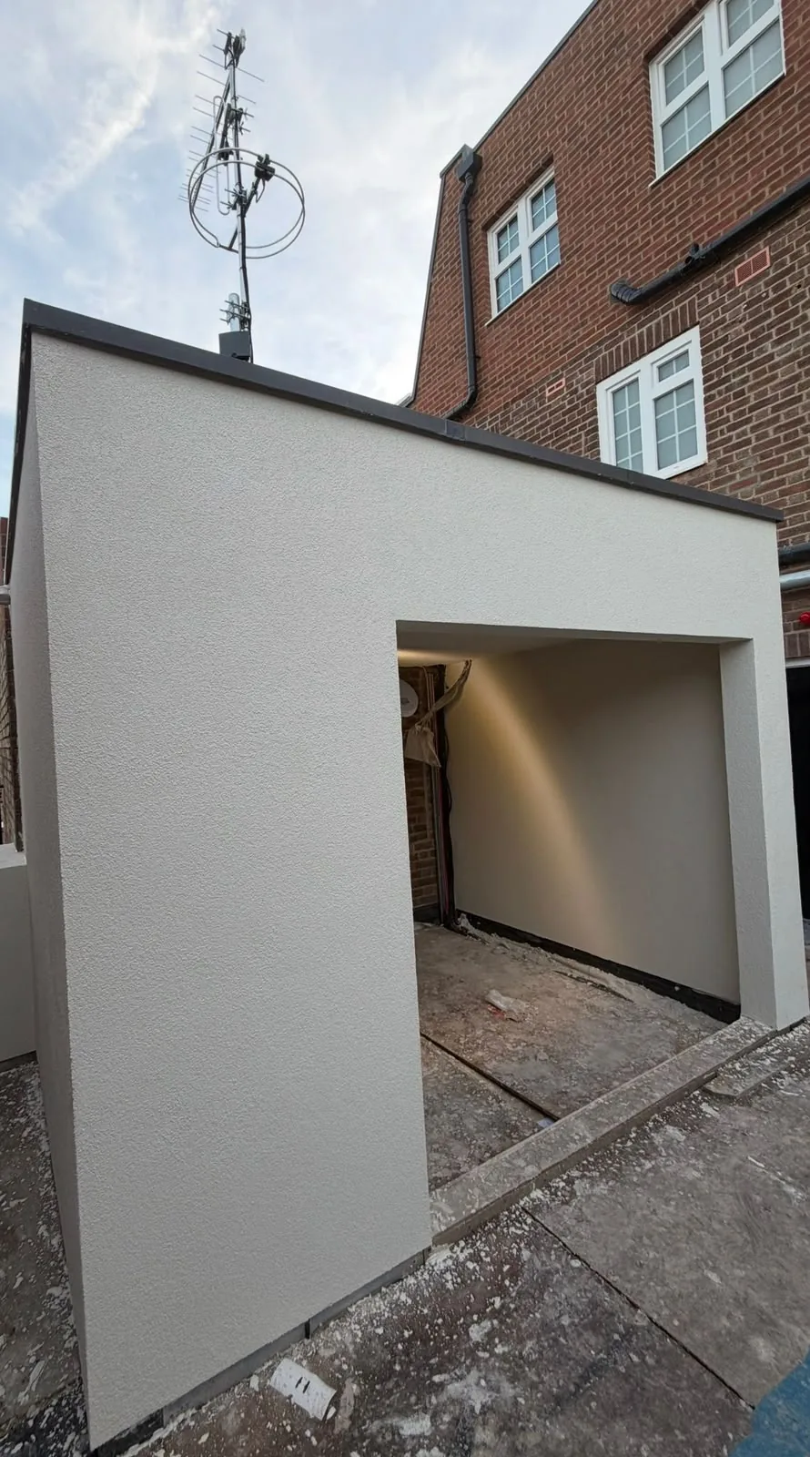 A finished rendered extension in Cambridge